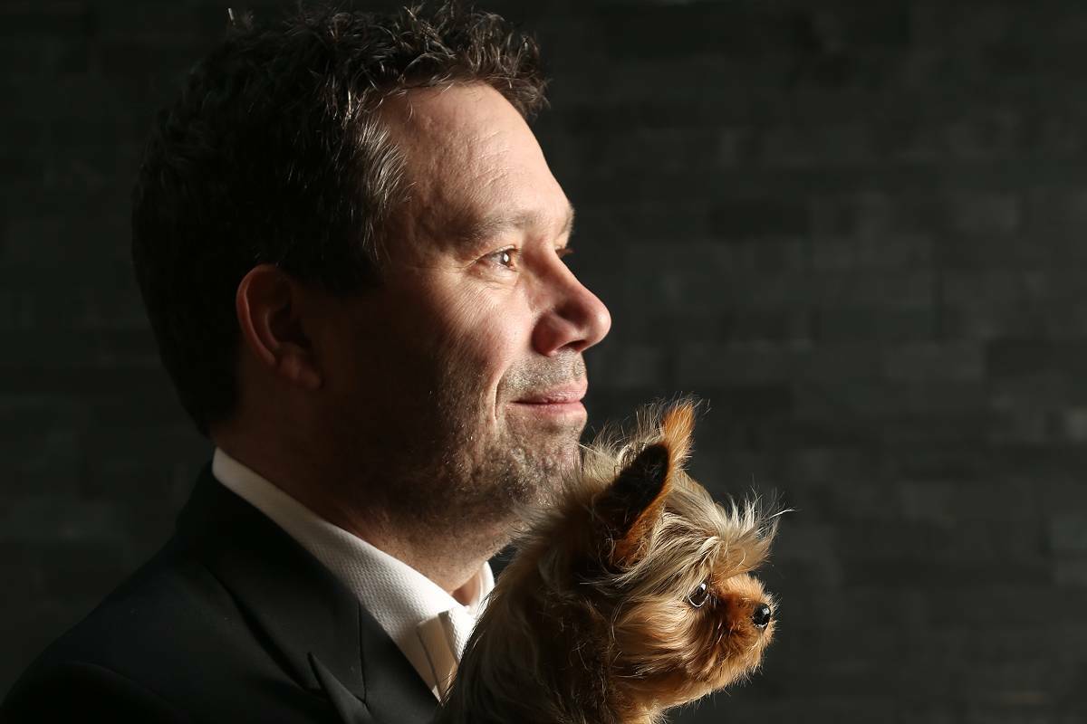 Arnold Arthur, pictured with his dog Arco, will be the guest conductor for Vancouver Island Symphony’s season finale Proms Island Style concert, showing at the Port Theatre on April 29. (Submitted photo)
