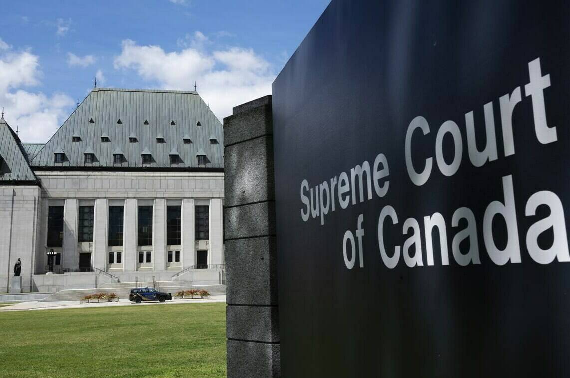The Supreme Court of Canada is seen Wednesday, Aug. 10, 2022, in Ottawa. The Supreme Court of Canada is set to rule Friday on an appeal by two men found guilty of first-degree murder in a mass gang slaying of six people in Metro Vancouver more than 15 years ago. THE CANADIAN PRESS/Adrian Wyld