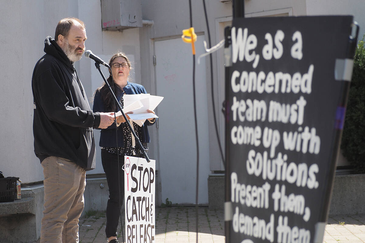 Clint Smith, Nanaimo business owner who was shot while attempting to retrieve stolen property, was among key speakers at the rally with Karen Kuwica, with Nanaimo Area Public Safety Association and one of the event organizers. (Chris Bush/ News Bulletin)