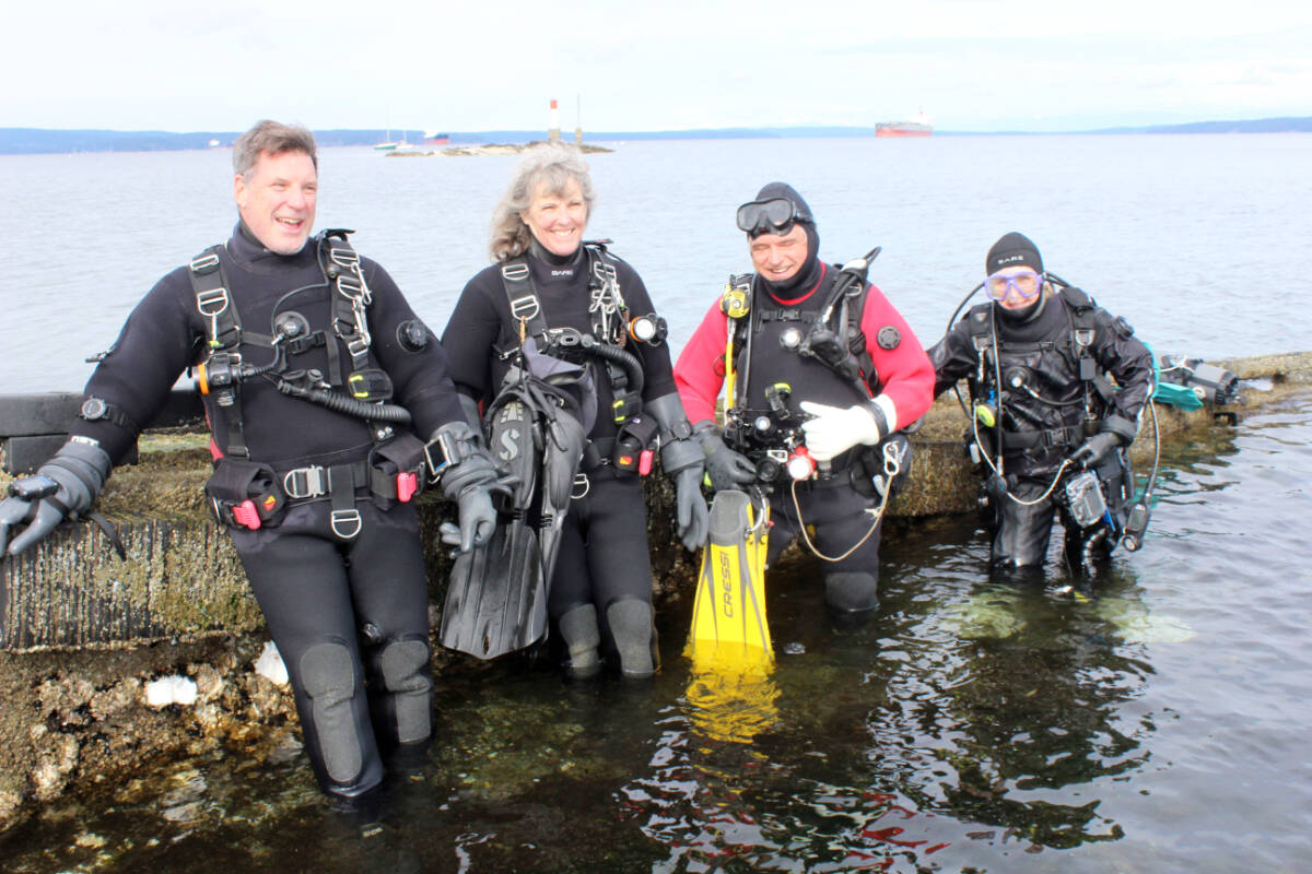 All geared up to check out the undersea sights around Chemainus, from left, are: Philip Smith, Nancy Bremner, Doug Biffard and Kathleen Fenner. (Photo by Don Bodger)