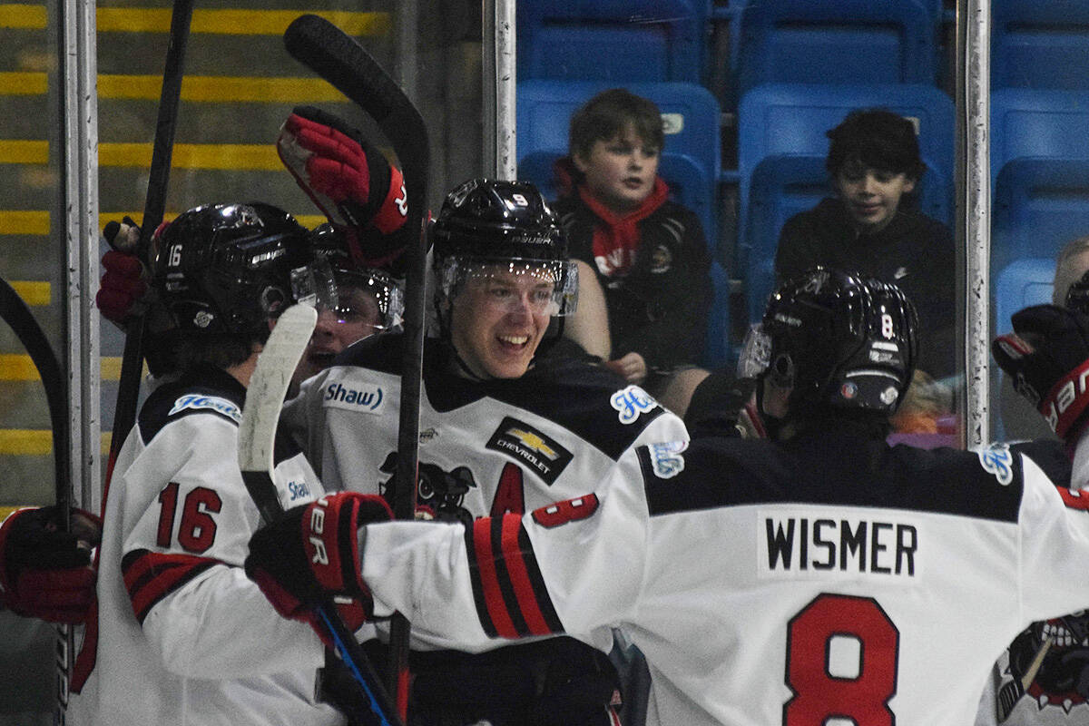 The Alberni Valley Bulldogs celebrate Ethan Bono’s goal in the first period of Game 2 against the Victoria Grizzlies on Saturday, April 1. (ELENA RARDON / Alberni Valley News)