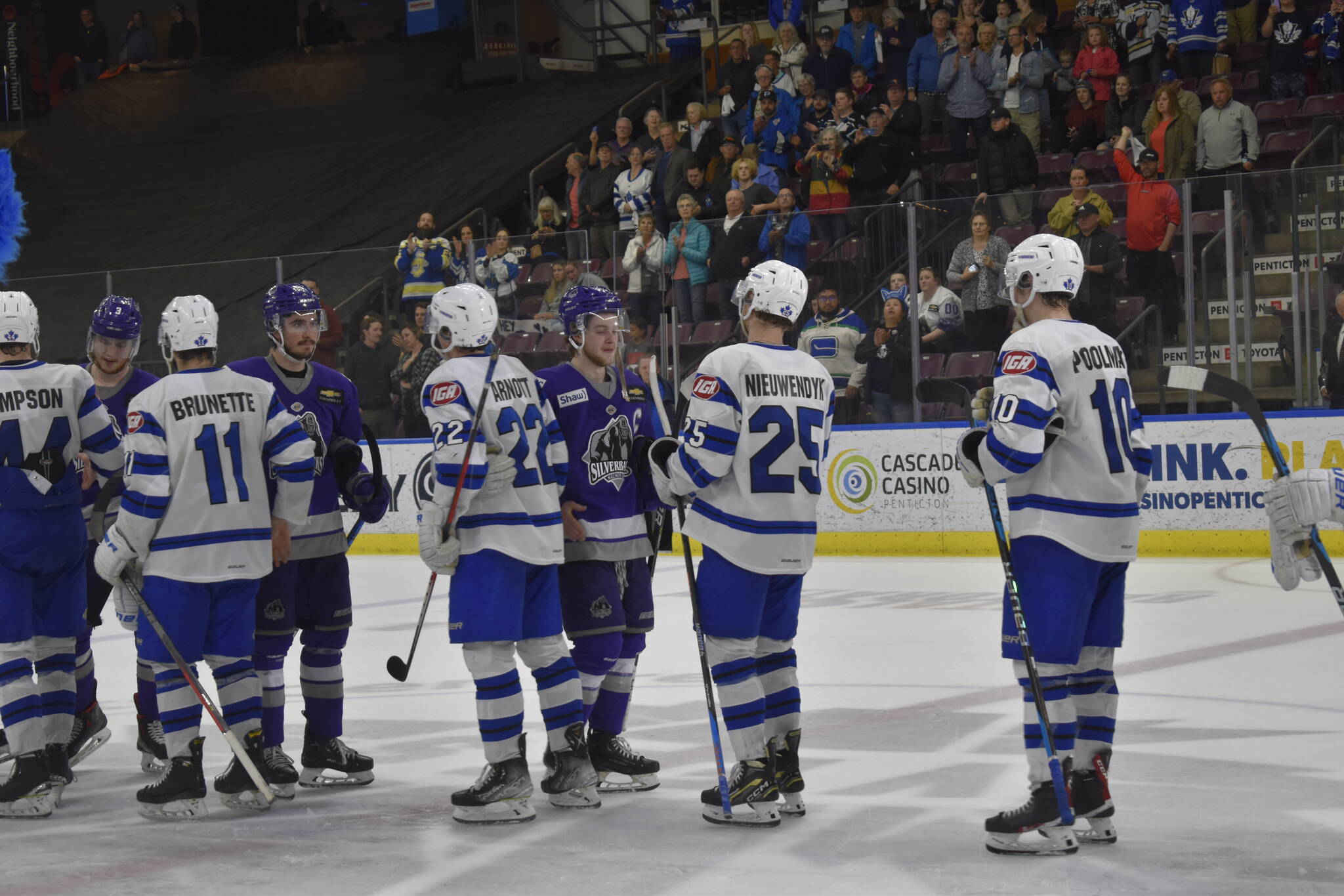 The Penticton Vees and Salmon Arm Silverbacks exchange handshakes following a five-game series in the Interior Conference Finals. (Logan Lockhart- Western News)