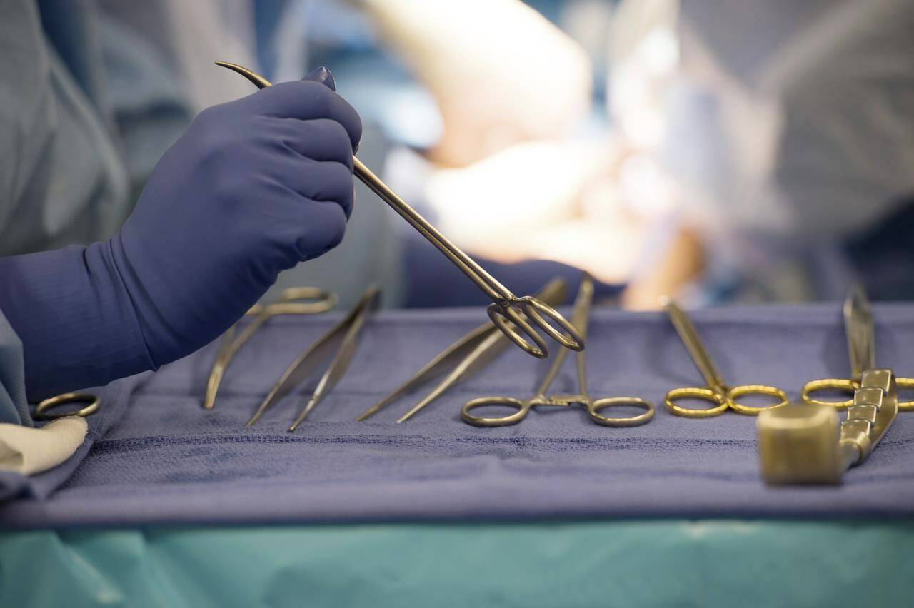 Surgical instruments are used during an organ transplant surgery at a hospital in Washington on Tuesday, June 28, 2016. THE CANADIAN PRESS/AP-Molly Riley