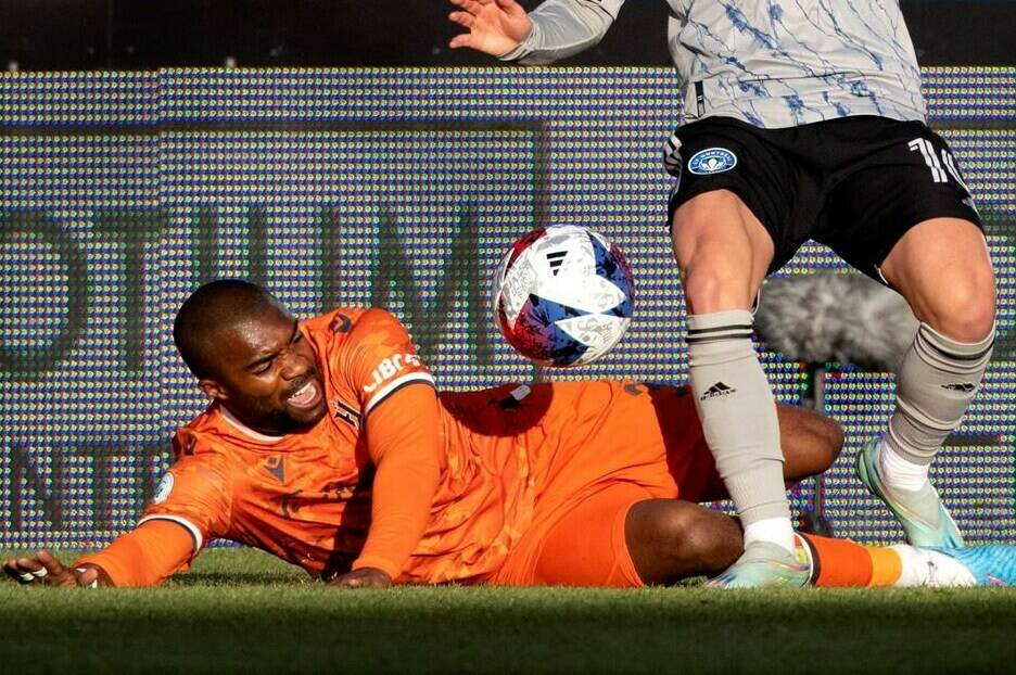 CF Montreal’s Bryce Duke (10) and Forge FC’s Ashtone Morgan (3) battle for the ball during first half Canadian Championship semifinal soccer action in Montreal on Wednesday, May 24, 2023. THE CANADIAN PRESS/Allen McInnis