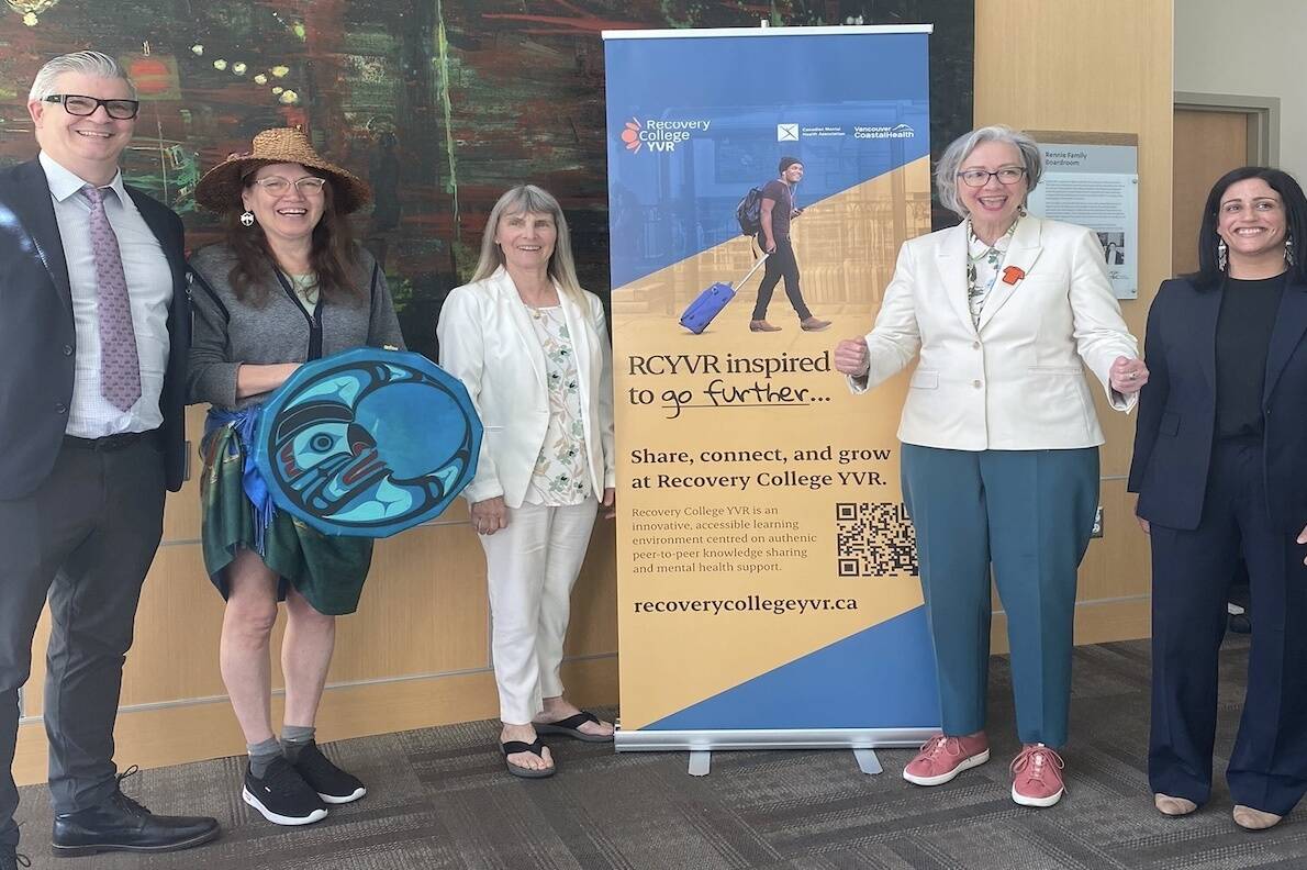 Andrew MacFarlane from VCH, Squamish Nation member, former elected councillor k'ana Deborah Baker, Minister of Mental Health and Addictions Jennifer Whiteside and Julia Kaisla, executive director of CMHA North and West Vancouver branch, celebrating the creation of Recovery College YVR, helping to focus on addressing gaps in mental health treatment, on May 2, 2023 (Charlotte Gilmour/Contributed to Black Press Media).