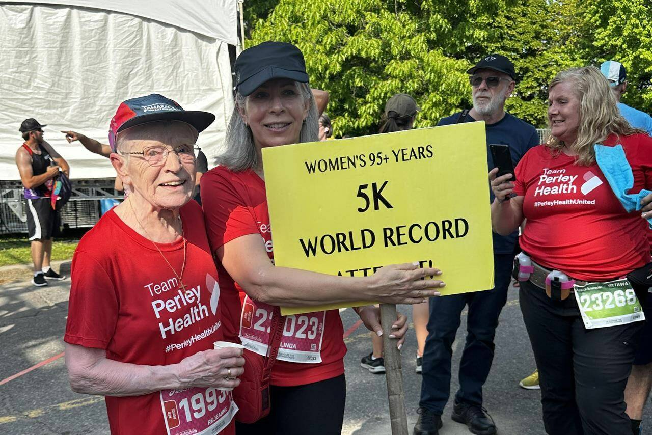 Ninety-six year old Rejeanne Fairhead, left, shown in this handout image, says until two years ago the most athletic things she had ever done involved bowling and horse shoes. Now she is a world-record holding racer. Fairhead completed the 5K race at the Tamarack Ottawa Race Weekend Saturday in just over 51 minutes. (Tamarack Ottawa Race Weekend photo)