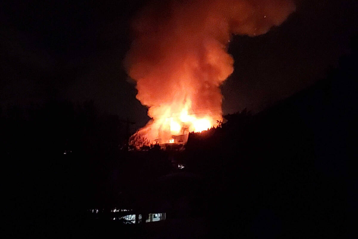 Firefighters in Coldstream are battling a major house fire on Hawthorne Place Friday, Jan. 14. (Roger Knox - Morning Star)