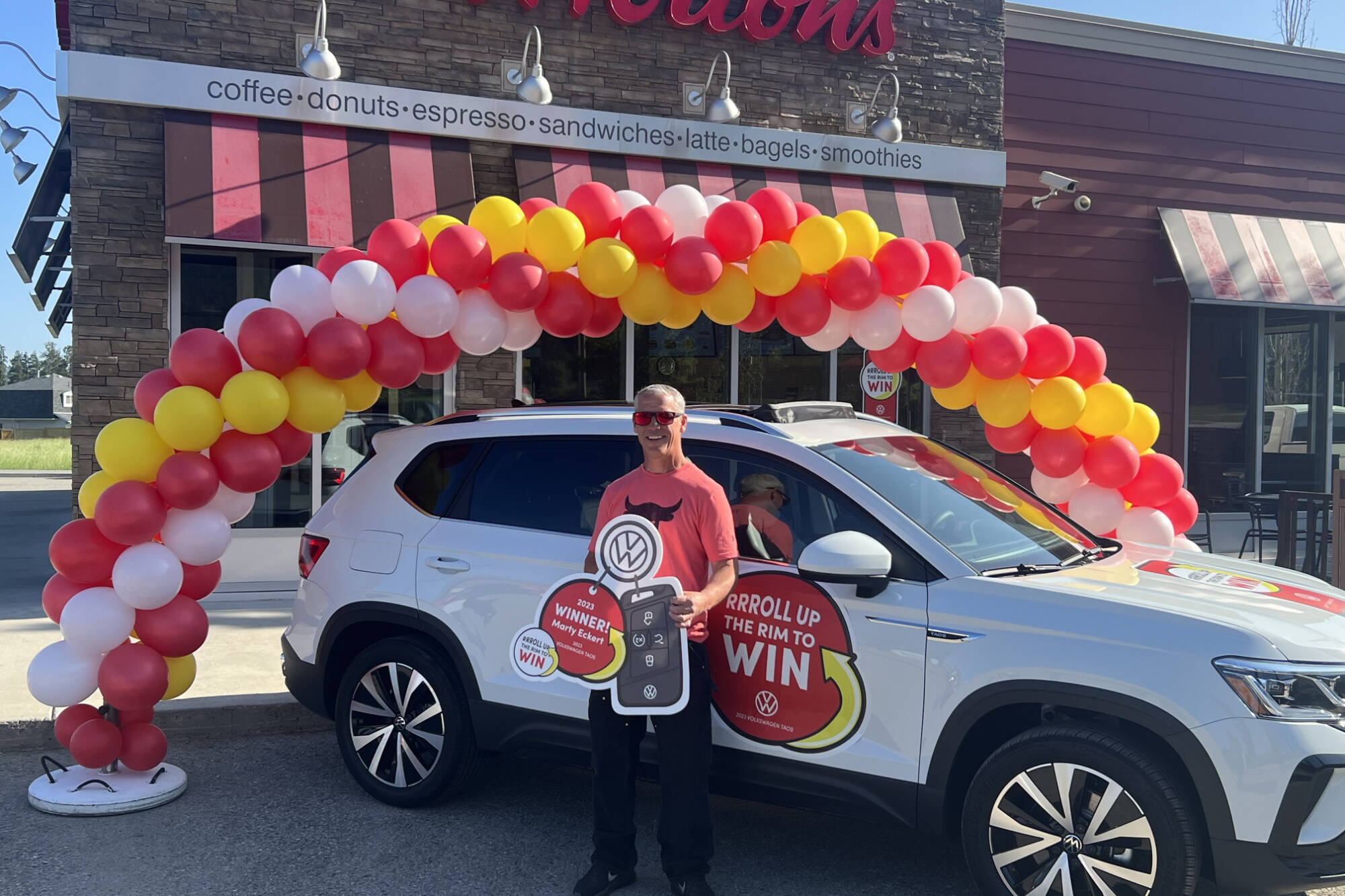 Armstrong’s Marty Eckert was handed the keys to his new Volkswagen Taos Wednesday, May 31, 2023. Eckert won the car through Tim Hortons’ Roll Up the Rim to Win contest. (Brendan Shykora - Morning Star)