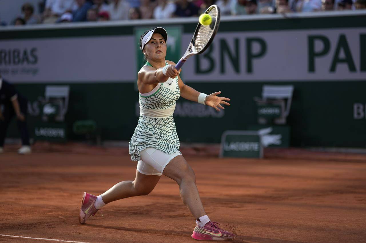 Canada’s Bianca Andreescu returns the ball to Ukraine’s Lesia Tsurenko during their third round match of the French Open tennis tournament at the Roland Garros stadium in Paris, Saturday, June 3, 2023. THE CANADIAN PRESS/AP-Thibault Camus