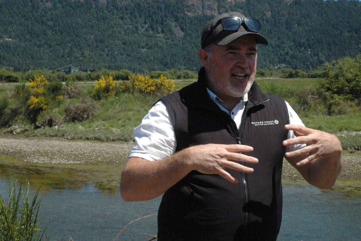Tom Reid, the west coast conservation land manager for the Nature Trust of BC, talks about plans to restore 70 hectares of the Cowichan River estuary during a tour of the area where the work will take place this summer on June 5. (Robert Barron/Citizen)