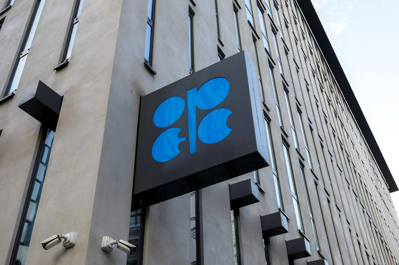 FILE - The logo of the Organization of the Petroleoum Exporting Countries (OPEC) is seen outside of OPEC’s headquarters in Vienna, Austria, on March 3, 2022. Leading oil-producing countries led by Saudi Arabia and Russia are wrestling with whether to make another cut in crude supplies to the global economy as the OPEC+ alliance struggles to prop up sagging oil prices that have been a boon to U.S. drivers and helped ease inflation worldwide. The group is meeting Sunday, June 4, 2023 at OPEC headquarters in Vienna after sending mixed signals about possible moves. (AP Photo/Lisa Leutner, File)