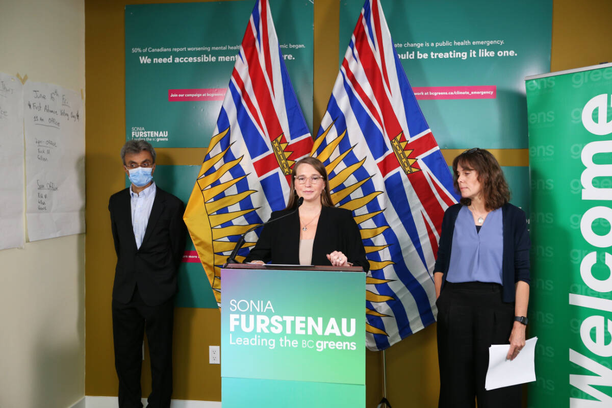 B.C. Green Party candidate for Langford-Juan de Fuca Camille Currie speaks during a health-care announcement Wednesday, June 14 at the party’s Langford office. With her is deputy party leader Dr. Sanjiv Gandhi, left, and leader Sonia Furstenau, right. The party is calling on the government to reform healthcare leadership amid what they are describing as a health-care crisis in B.C. (Justin Samanski-Langille/News Staff)