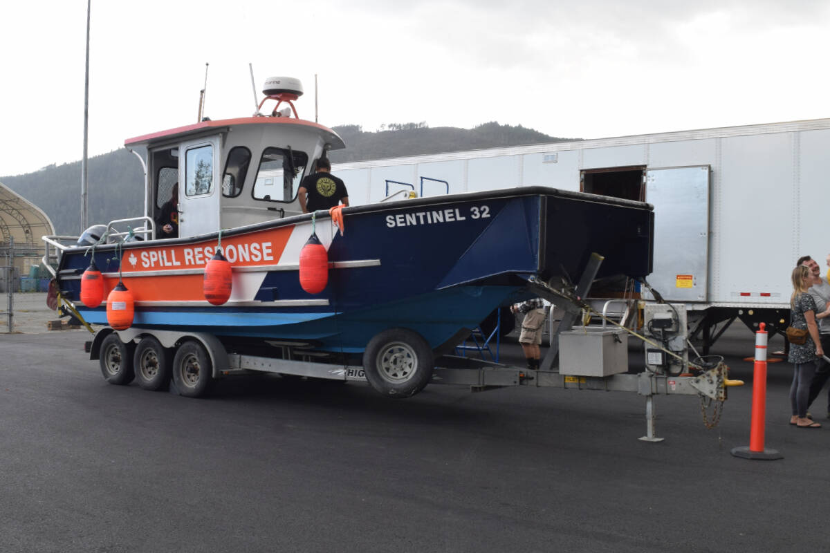 Visitors tour a WCMRC workboat as part of the spill response base’s grand opening on Tuesday, June 15. (ELENA RARDON / Alberni Valley News)