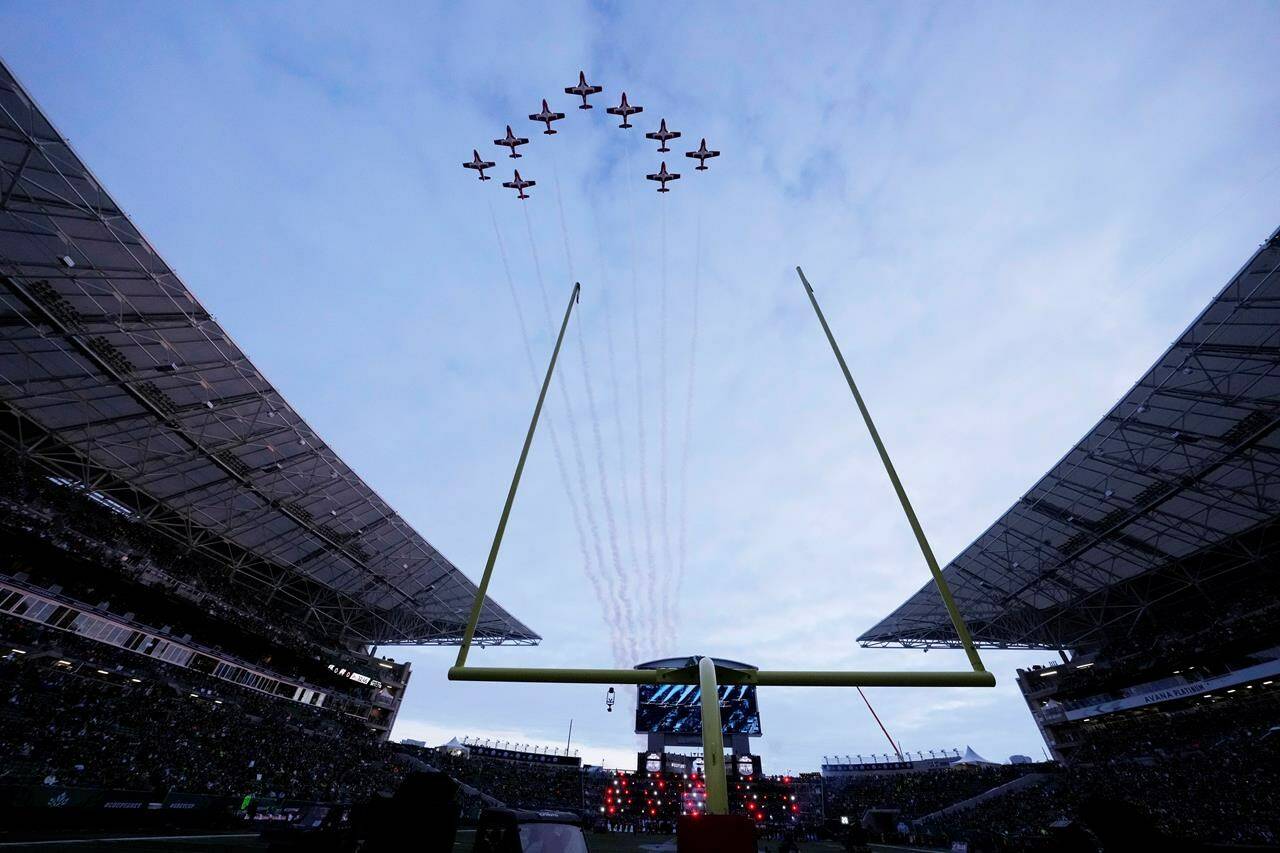 The Canadian Forces Snowbirds complete a fly-over Mosaic Stadium ahead of the start of the 109th Grey Cup between the Toronto Argonauts and the Winnipeg Blue Bombers in Regina, Sunday, Nov. 20, 2022. THE CANADIAN PRESS/Frank Gunn