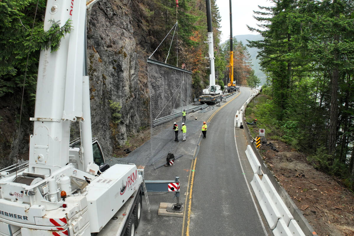 Crews install mesh barriers along Cameron Bluffs on Highway 4 to protect the road from falling debris. (PHOTO COURTESY MINISTRY OF TRANSPORTATION AND INFRASTRUCTURE)