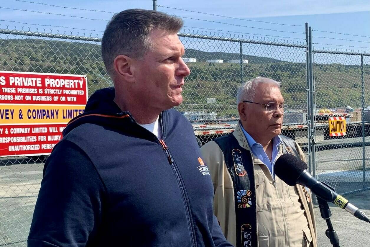Sean Leet, left, chairman of Horizon Maritime Services, stands with Chief Mi’sel Joe of the Miawpukek First Nation, at a news conference at the harbour in St. John’s, Wednesday, June 21, 2023. Underwater noises described as “banging” have been heard in an area of the Atlantic where a submersible disappeared three days ago near the wreck of the Titanic, search officials confirmed Wednesday. THE CANADIAN PRESS/Sarah Smellie