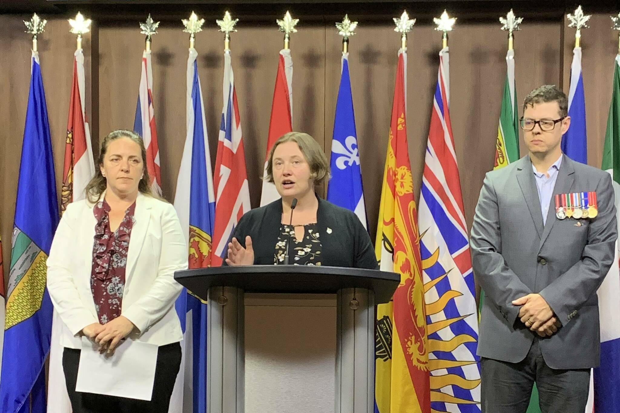 North Island-Powell River MP Rachel Blaney called on the federal government to cancel outsourcing veterans affairs contracts. To the left is UVAE president Virginia Vaillancourt and to the right is Veteran Chris Banks. Photo courtesy NDP