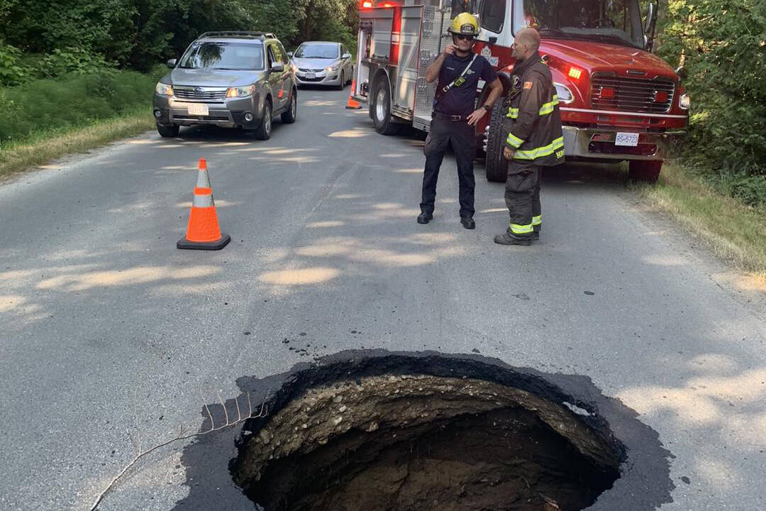 A sinkhole closed a portion of Beaver Point Road on Salt Spring Island Sunday evening. (Salt Spring Fire Department/Facebook)