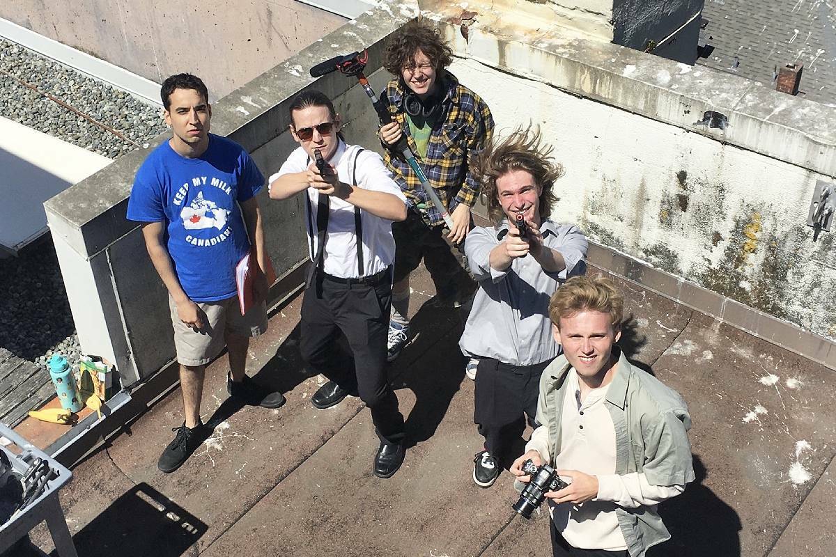 Suksham Shan, left, Matt Garvey, Pluto Hall, Sam Follis and Nate Jackson in downtown Victoria last summer while filming Joe Rule’s independent film ‘A Reel Heist.’ (Submitted photo)
