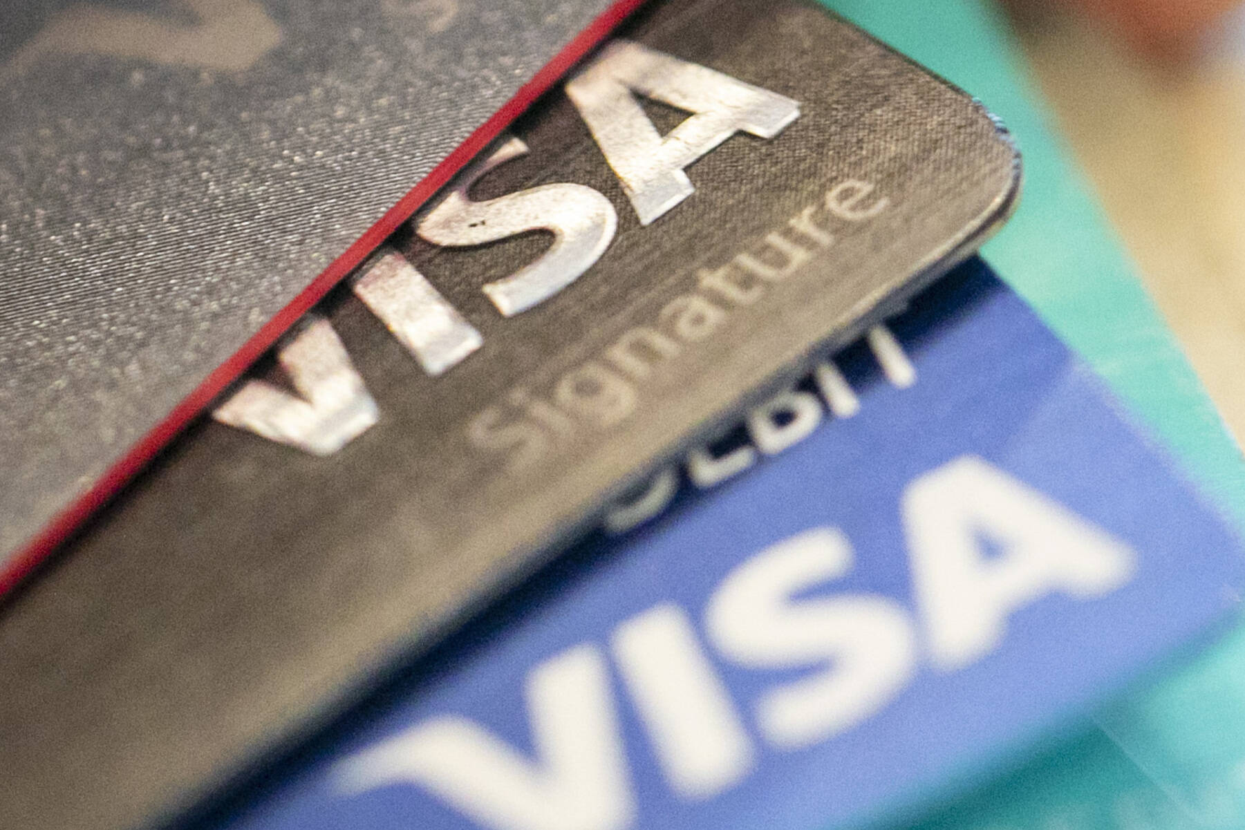 Most Canadians prefer to pay for things with credit cards, and even though 51 per cent of survey respondants say they’re happy with the current legal tender in Canada, 49 per cent said introducing new methods of payment would be a point of interest. (AP Photo/Jenny Kane, File)