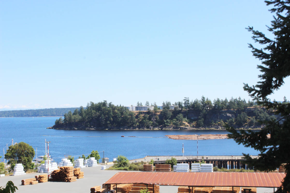 The view of the Chemainus harbour from the Waterwheel Plaza looked about the same throughout much of June and into July, with bright blue skies and water. (Photo by Don Bodger)