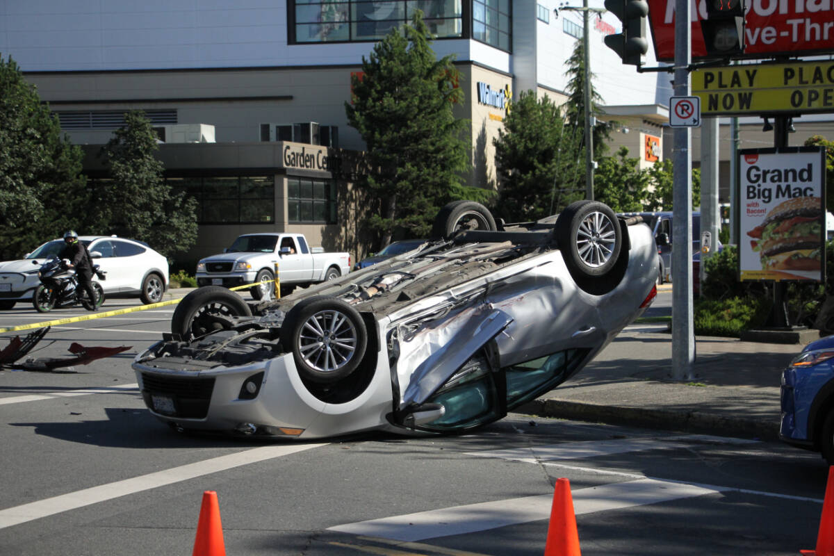 The Saanich Road and Oak Street intersection at Uptown saw 26 crashes in 2022, including this July rollover. (Black Press Media file photo)