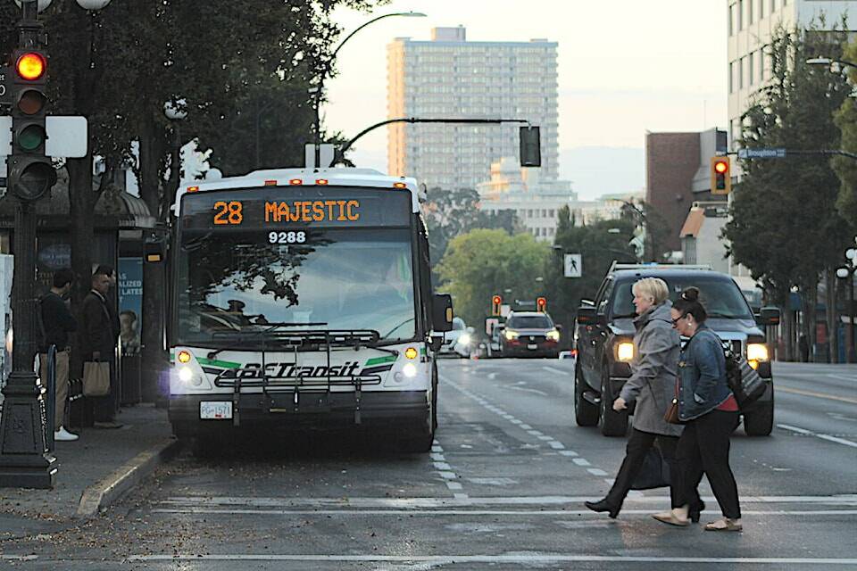 BC Transit is rolling out tap-and-go fare options in a Greater Victoria pilot before they’re expanded to 30 other transit systems in the province. A BC Transit bus picks up passengers from a Douglas Street stop during the morning commute. (Black Press Media file photo)