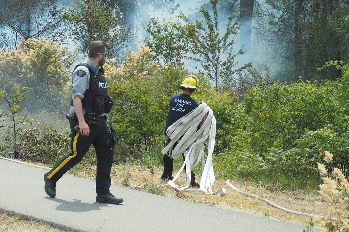 A person has been charged with arson and mischief after allegedly setting fires along the Nanaimo Parkway earlier this week. (Chris Bush/News Bulletin)