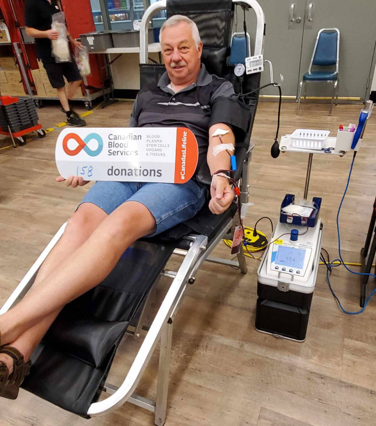 Keith Palou making his 158th blood donation overall. (Photo by Canadian Blood Services)