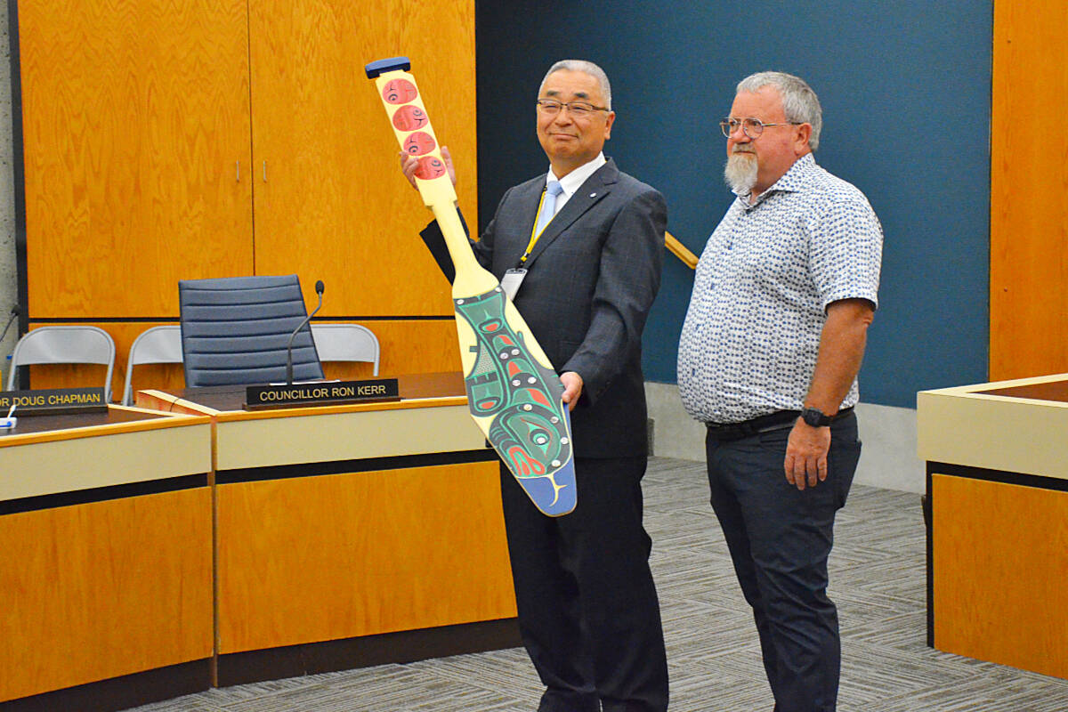 Ishakari Deputy Mayor Hidenobu Kamada and Campbell River Mayor Kermit Dahl exchanged gifts and signed an agreement to continue the sister city relationship between the two cities on July 6, 2013, during a trip to commemorate the 40th anniversary of the cities’ twinning relationship. Photo by Alistair Taylor/Campbell River Mirror