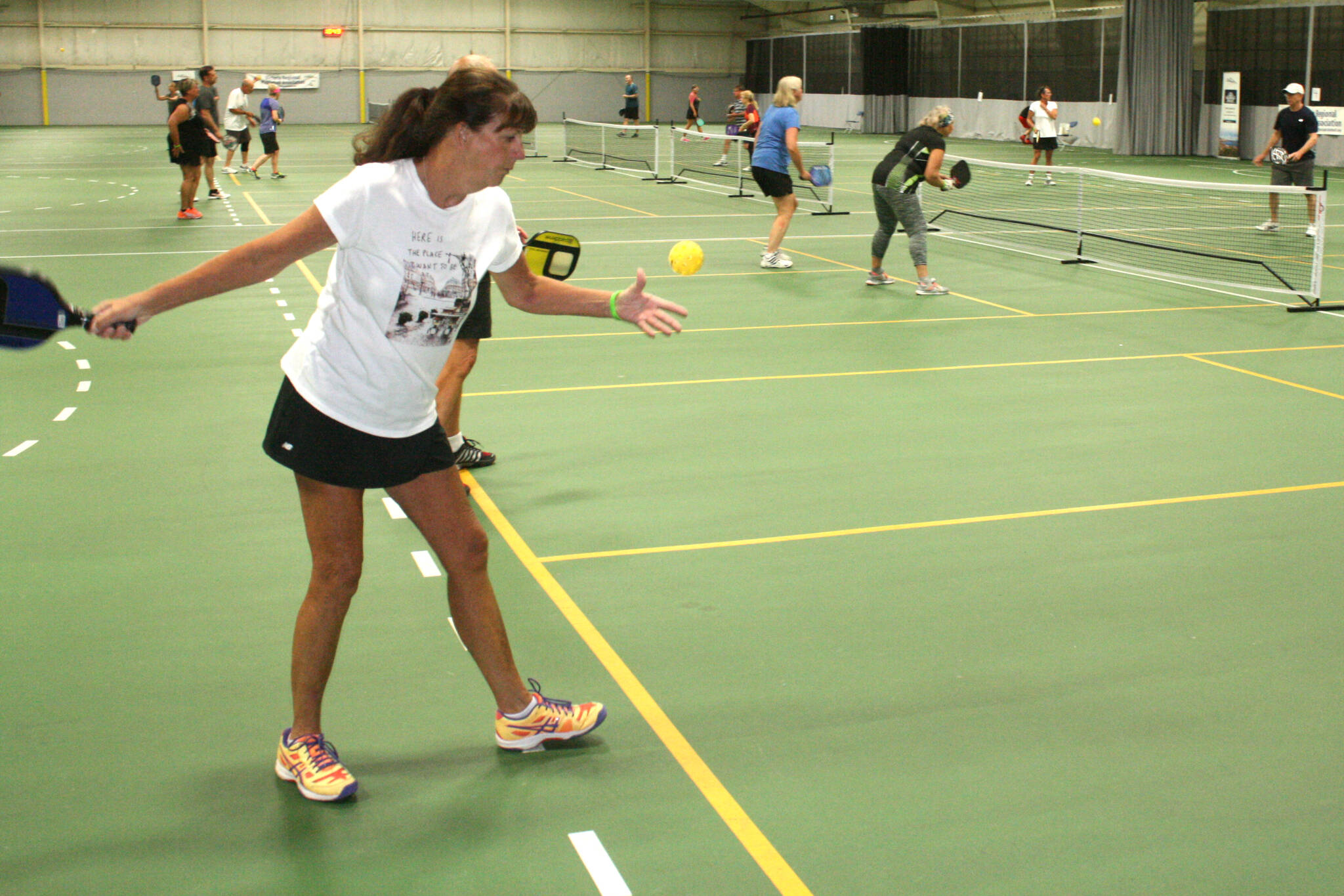 Teri Kielbiski serves up the ball during the first Victoria Regional Pickleball Association Tournament held in 2021 at Pearkes Recreation Centre. The tournament drew more than 80 teams from across Vancouver Island and the Lower Mainland. (Black Press Media file photo)