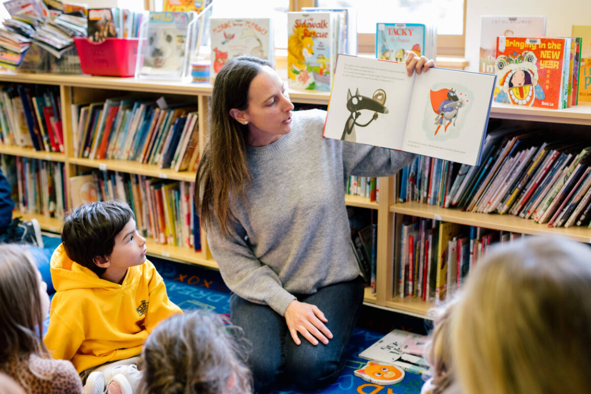 Conseil Scolaire Francophone (CSF) teacher in Whistler reading to students. (Courtesy of CSF via UVic)