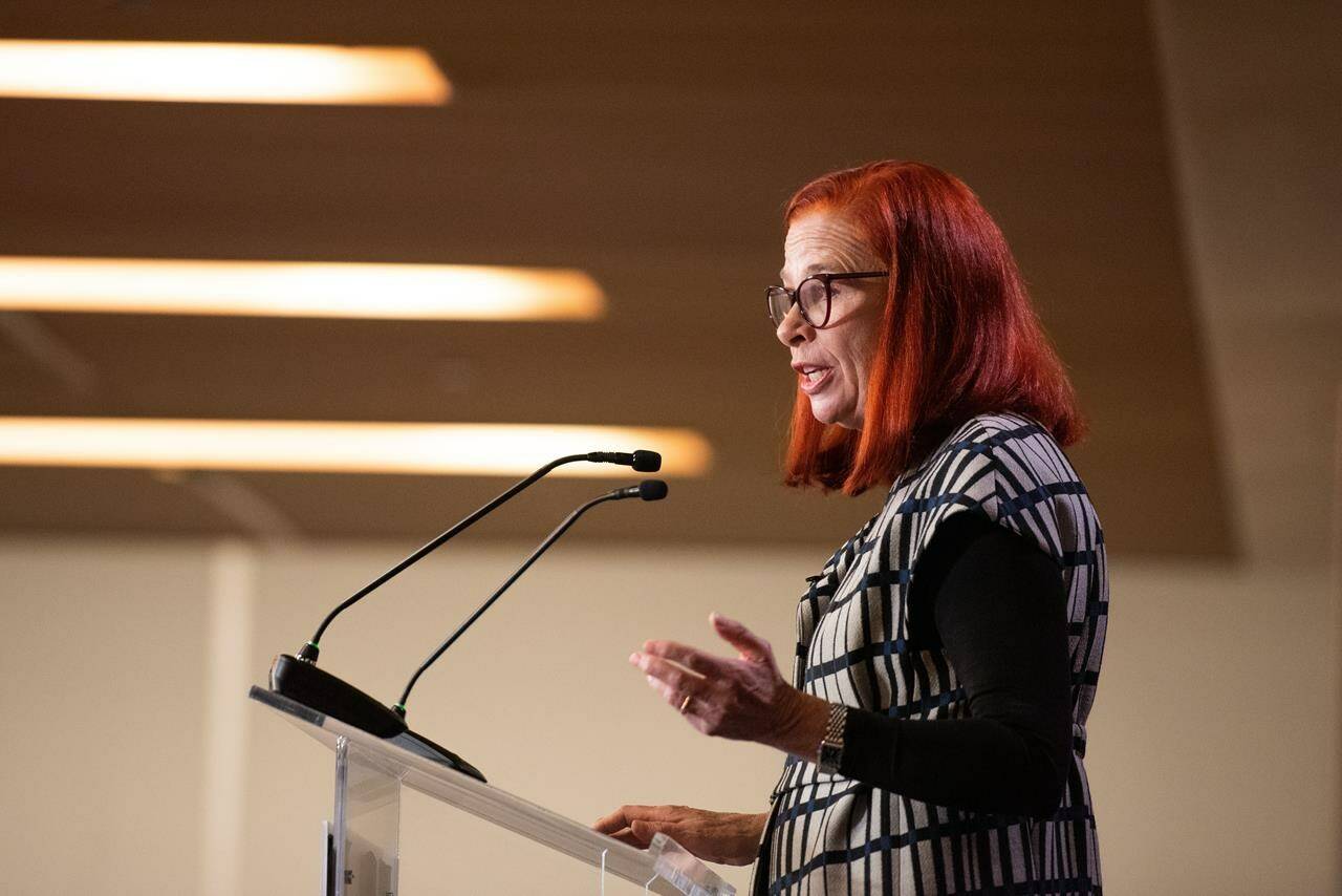 President and CEO of CBC/Radio-Canada Catherine Tait speaks during a panel discussion in Ottawa, on Thursday, Dec., 1, 2022.The head of Canada’s public broadcaster caused worry and unease in the newsrooms under her command after suggesting earlier this year that CBC would eventually cease broadcasting on TV and radio, internal documents show. THE CANADIAN PRESS/Spencer Colby