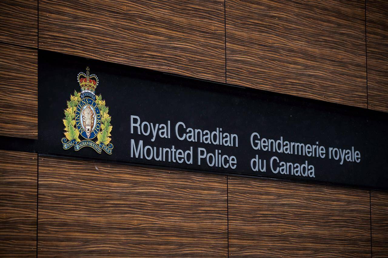 The RCMP logo is seen outside Royal Canadian Mounted Police “E” Division Headquarters, in Surrey, B.C., on Friday April 13, 2018. THE CANADIAN PRESS/Darryl Dyck
