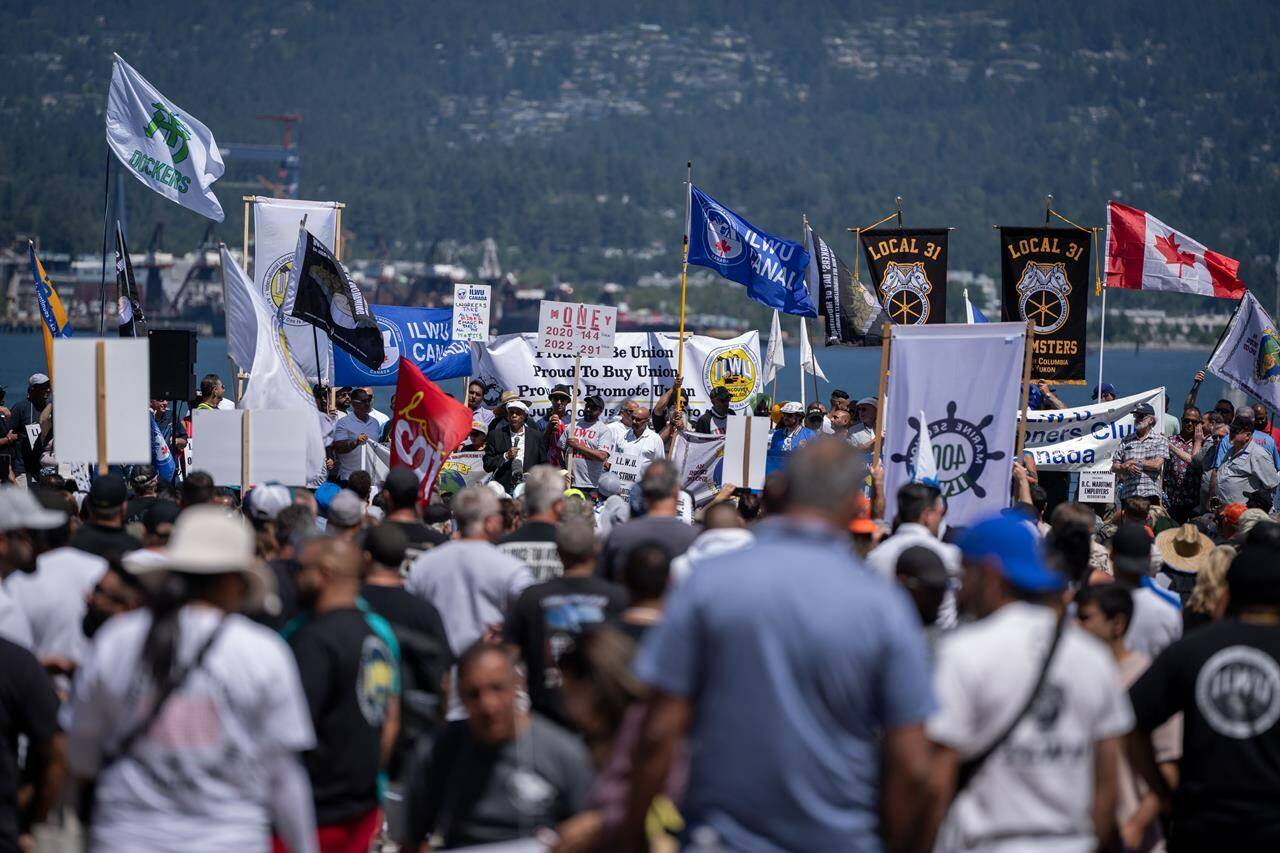Willie Adams, international president of the International Longshore and Warehouse Union, speaks at a strike rally in Vancouver on Sunday, July 9, 2023. Labour observers are urging caution ahead of a union vote that could end the long-running B.C. port dispute this week, saying there’s a history of union members rejecting deals struck at the negotiating table. THE CANADIAN PRESS/Ethan Cairns
