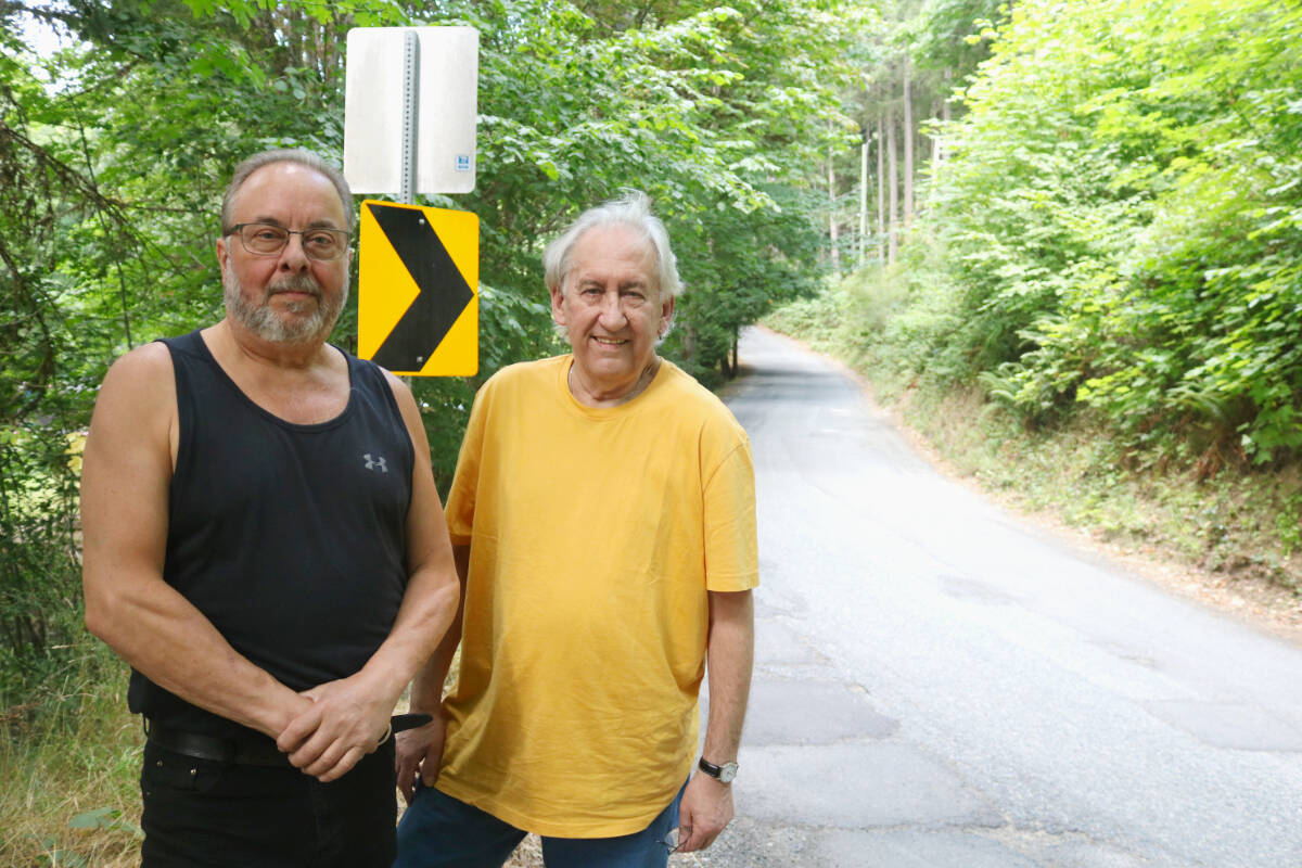 Steve Drane and Ross Munro have lived on Falcon Heights Road off of Finlayson Arm for years, but say traffic has worsened in recent years with construction along the Malahat Highway near Goldstream Provincial Park. (Bailey Moreton/News Staff)