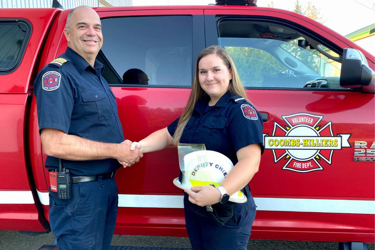 Coombs Hilliers Volunteer Fire Department Fire Chief Ron Schildroth congratulates Theresa Benoit for her appointment as full-time Deputy Fire Chief. (CHVFD photo)