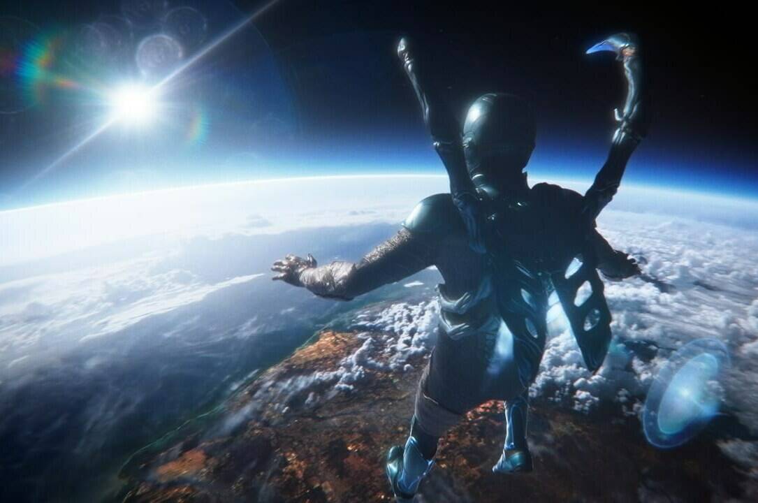 This image released by Warner Bros. Pictures shows Xolo Maridueña in a scene from “Blue Beetle.” (Warner Bros. Pictures via AP)