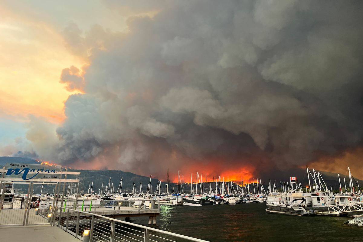 Large flames rise from McDougall Creek blaze on Thursday. (Contributed)