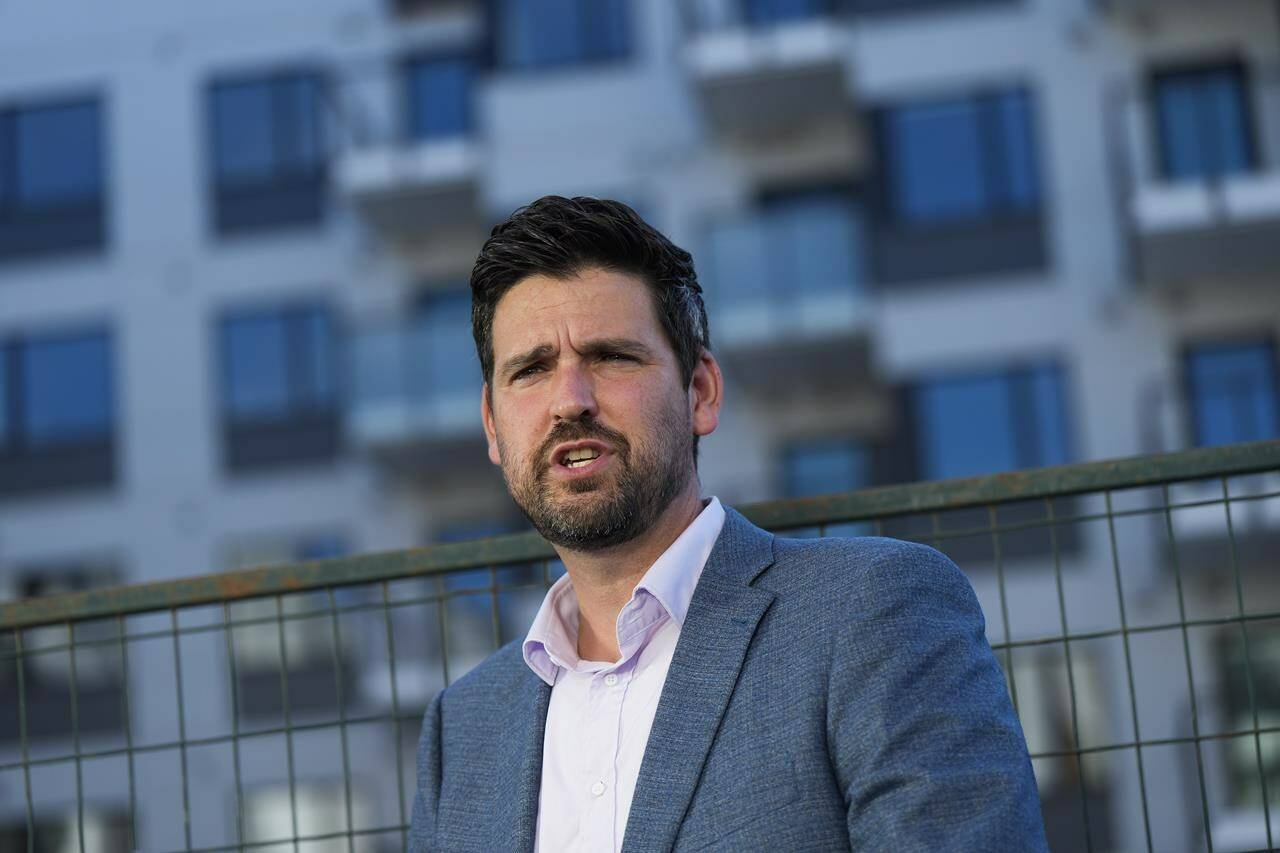 Sean Fraser, Minister of Housing, Infrastructure and Communities, speaks during an announcement outside a rental housing building being developed by the University of British Columbia Properties Trust, in Vancouver, on Wednesday, August 16, 2023. THE CANADIAN PRESS/Darryl Dyck