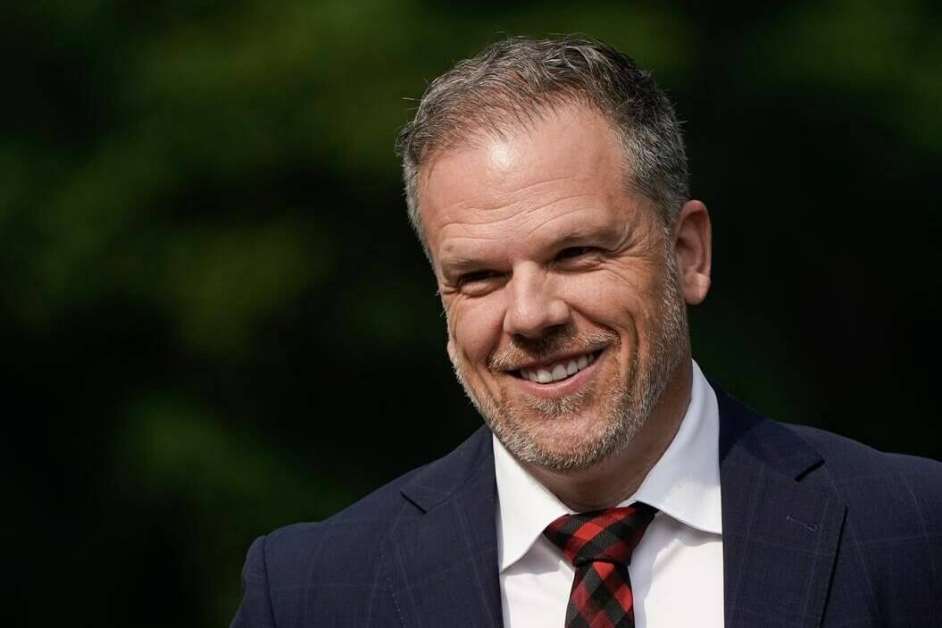 Newly appointed Health Minister Mark Holland says accountability for new federal health funding will largely come from Canadians themselves. Holland smiles as he makes his way to a cabinet shuffle, in Ottawa, Wednesday, July 26, 2023. THE CANADIAN PRESS/Adrian Wyld