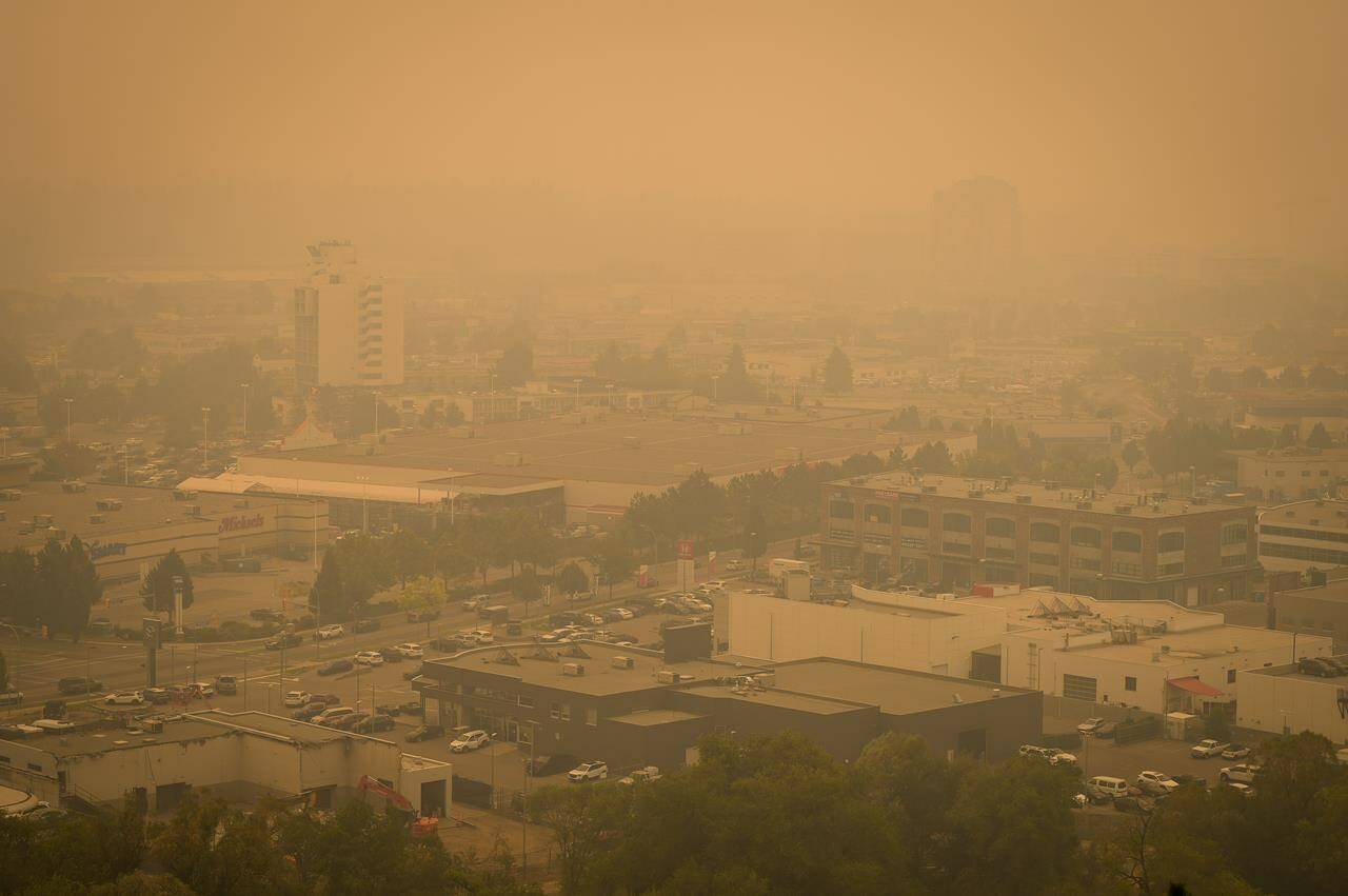 British Columbia’s desperate battle against hundreds of wildfires continues on multiple fronts today, but no new evacuation orders have been added overnight to the thousands already in place across the province. Smoke from wildfires fills the air in Kelowna, B.C., Saturday, Aug. 19, 2023. THE CANADIAN PRESS/Darryl Dyck