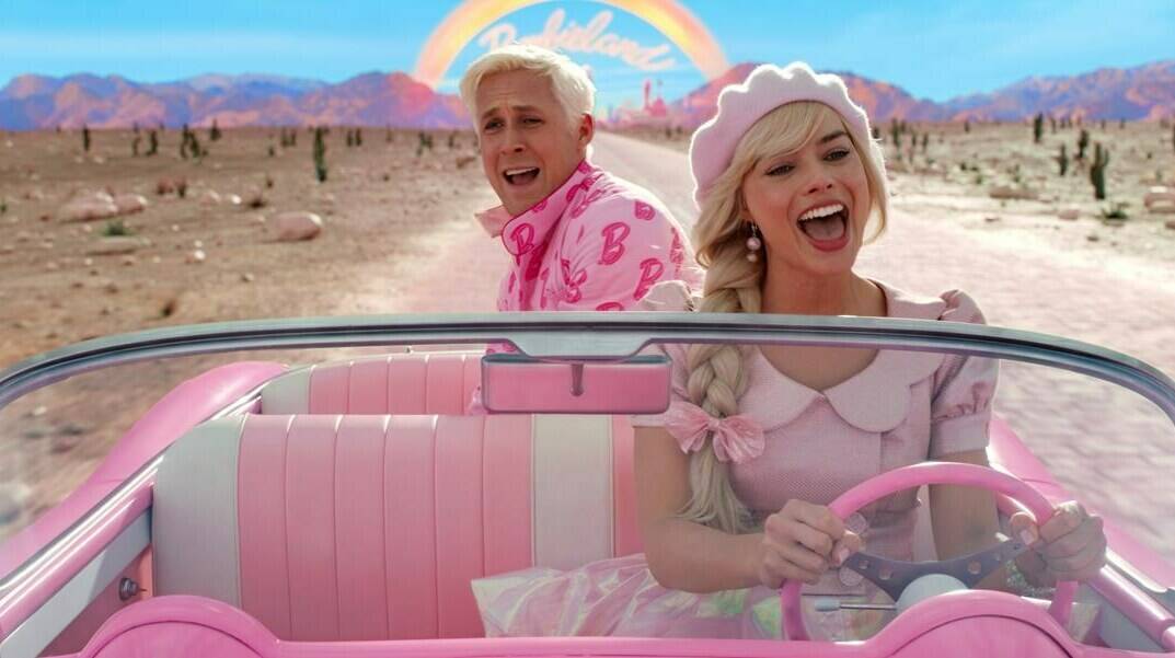 This image released by Warner Bros. Pictures shows Ryan Gosling, left, and Margot Robbie in a scene from “Barbie.” (Warner Bros. Pictures via AP)