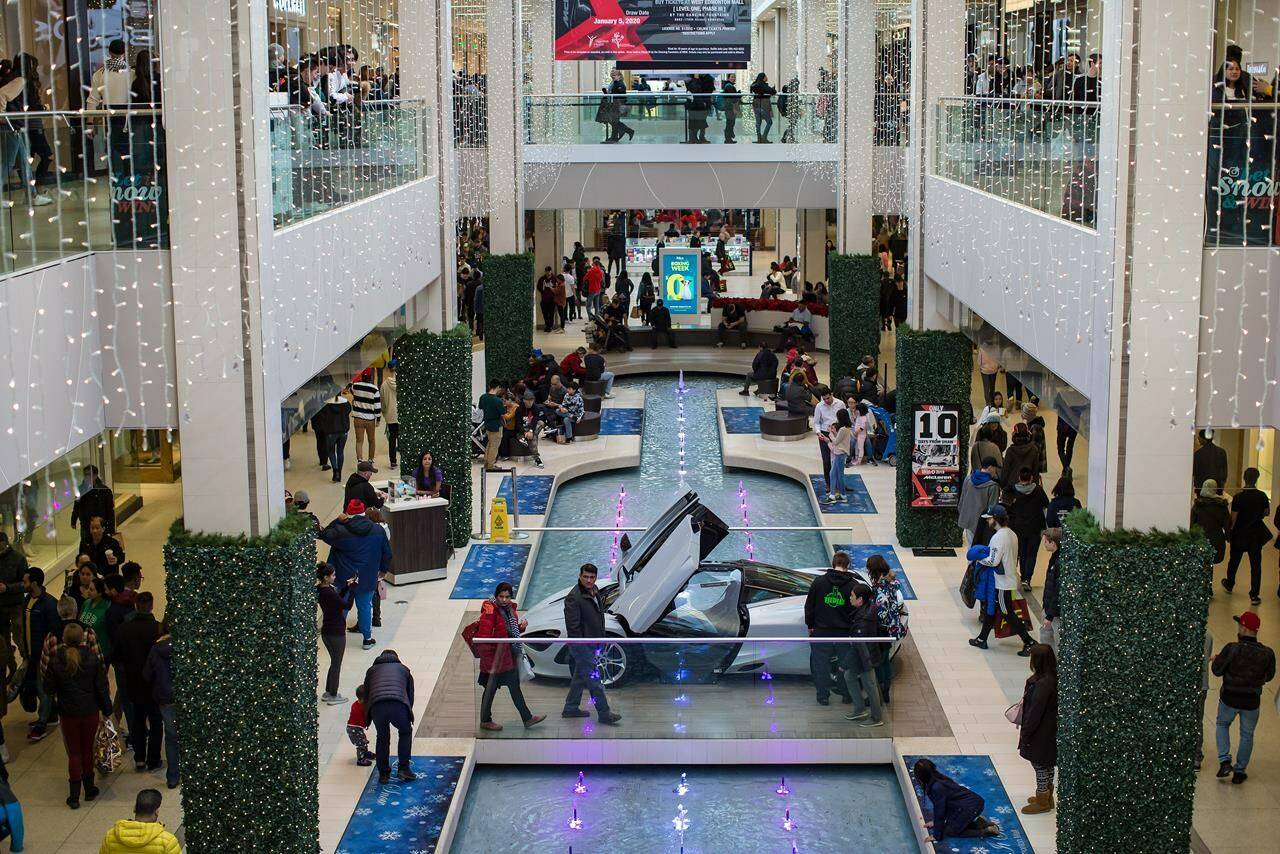 Shoppers make their way through West Edmonton Mall in Edmonton, Thursday, Dec. 26, 2019. THE CANADIAN PRESS/Darryl Dyck