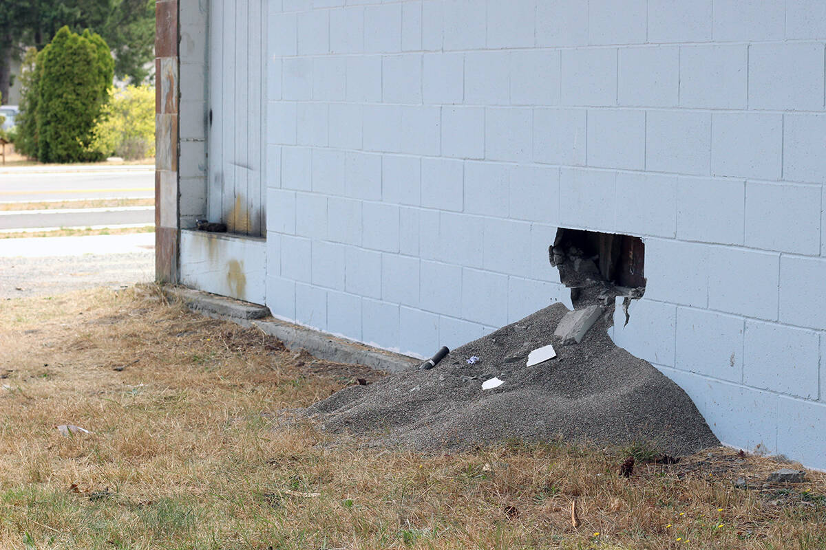 A thief or thieves cut a hole through the wall to try to gain entry to Deals 4 You store on Metral Drive. (News Bulletin photo)
