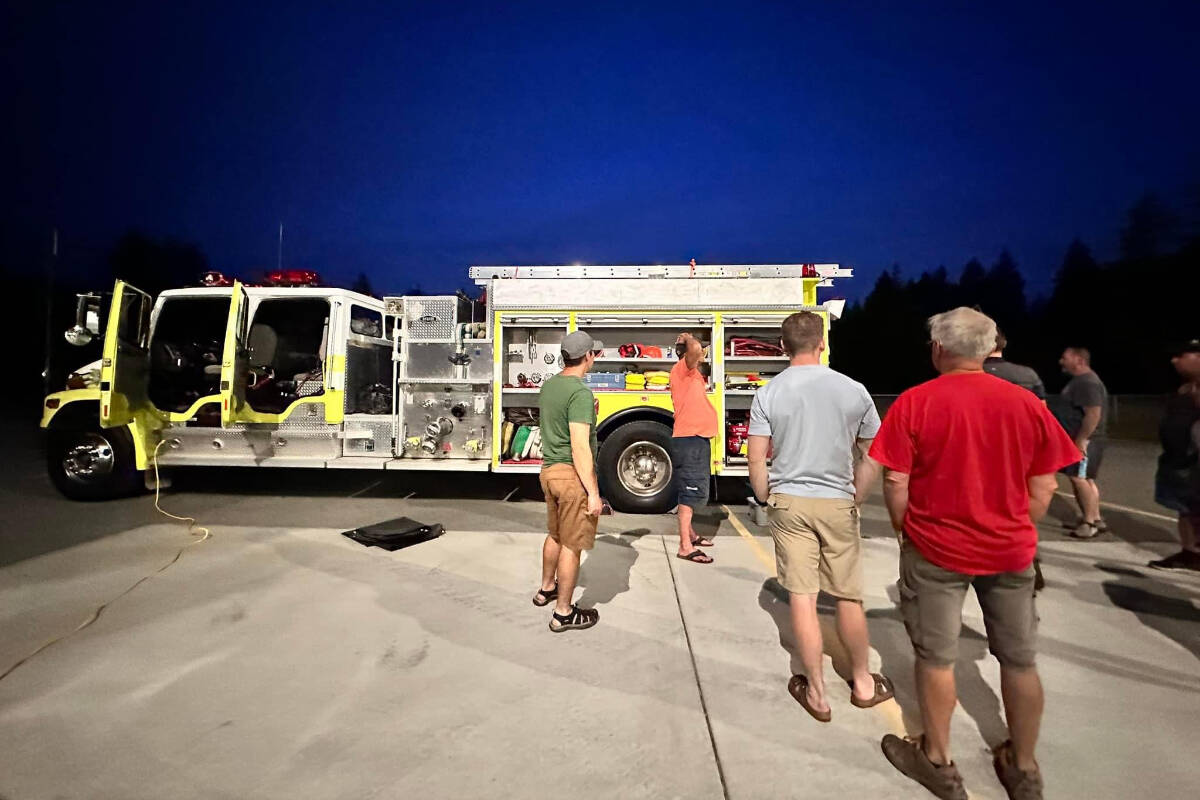 Beaver Creek VFD members ensure the department’s engine is packed for deployment to Kelowna. (BEAVER CREEK VFD PHOTO)