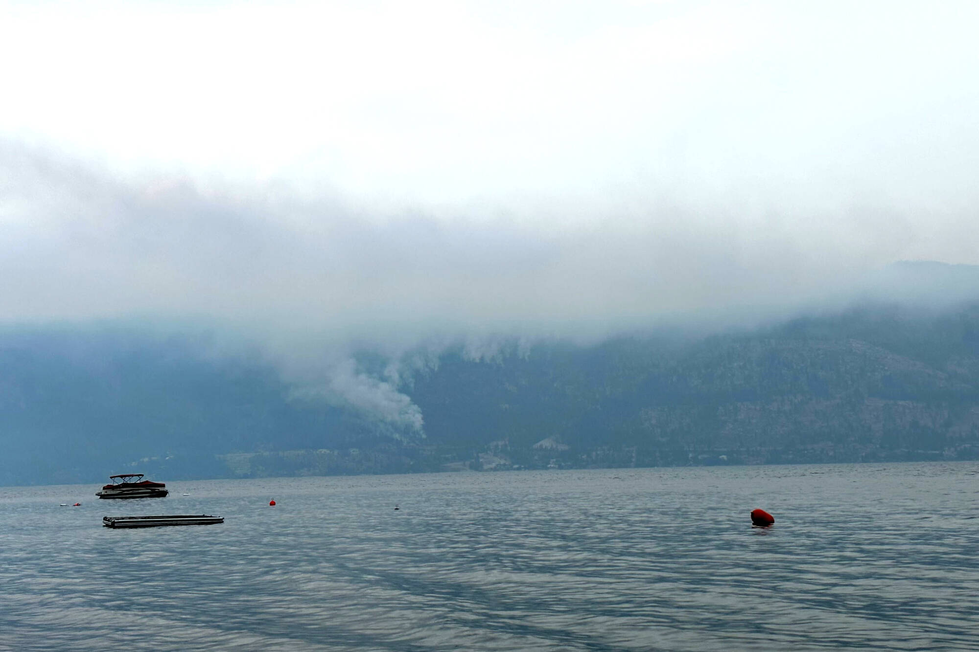 Trails of wildfire smoke seen from Okanagan Centre south of Ceasars close to Shelter Cove Tuesday, April 22, 2023. (Jordy Cunningham - Black Press Media)