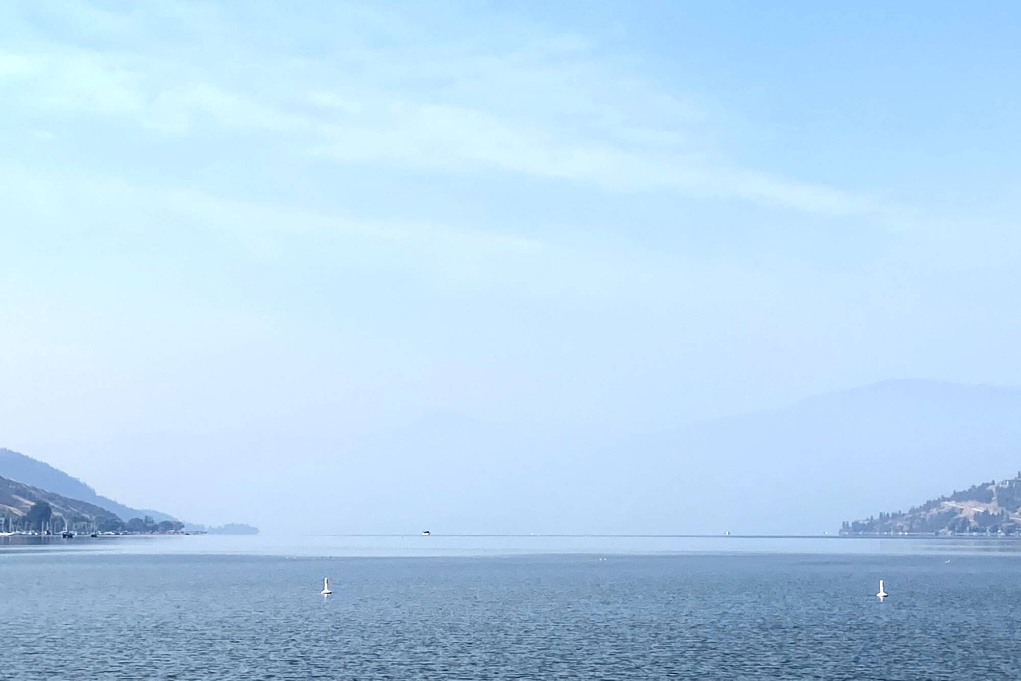 Wildfire smoke continues to fill the air, as seen over Okanagan Lake from Vernon Friday, Aug. 25. (Jennifer Smith - Morning Star)