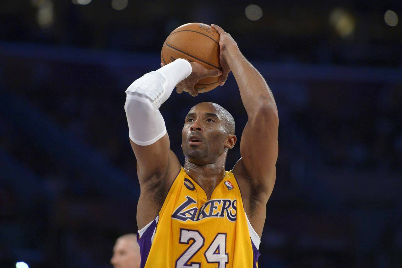 Los Angeles Lakers guard Kobe Bryant shoots a free throw during an NBA basketball game against the Golden State Warriors on April 12, 2013, in Los Angeles. (AP Photo/Mark J. Terrill, File)