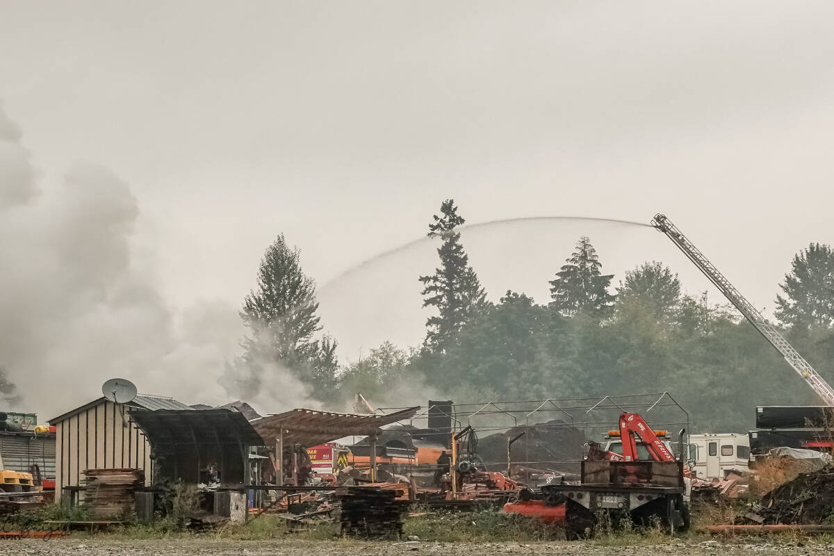 Dozens of firefighters worked to put out a mulch fire at a woodlot near Ladysmith on Tuesday, Aug. 29. (Photo courtesy Bob Burgess)